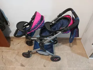 Carro gemelar de juguete con bolso