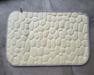 Alfombra de baño gris efecto piedras