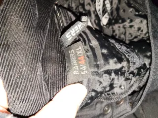 Pantalón de moto negro y rosa