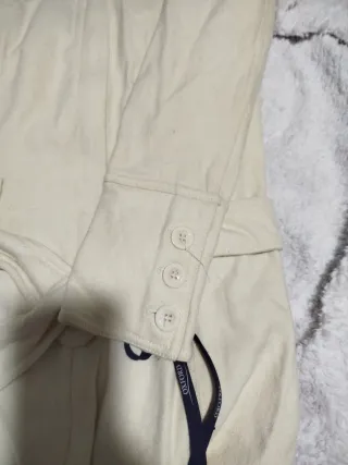 Chaquetón beige con cinturón