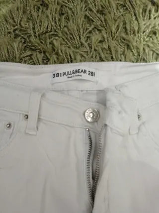 Pantalones vaqueros blancos con raya lateral