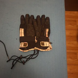 Pantalones y guantes de nieve con bolsa