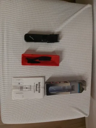 Regolabarba e capelli a batteria