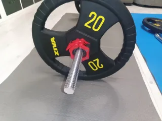 Barra 1.50m + 2 discos 20kg Ziva