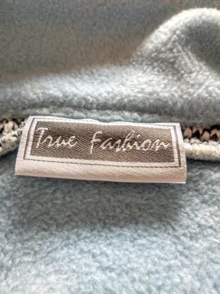 Sudadera polar señora azul y crema.