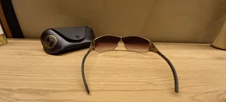 Gafas de sol Ray-Ban plateadas y marrones