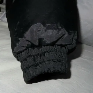 Abrigo plumífero Bosker negro y amarillo