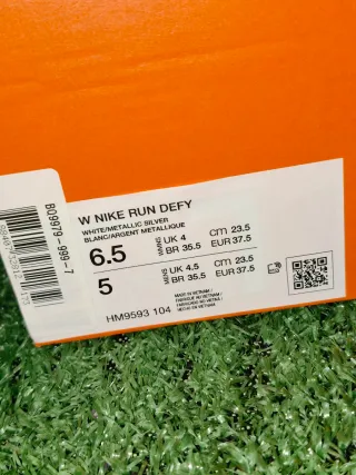 Nike Run Defy Mujer Blanco Plata
