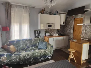 Amplia casa con 4 dormitorios.