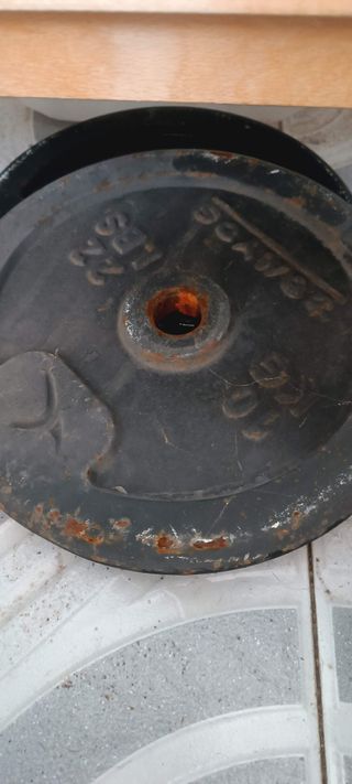 Discos de pesas Decathlon (100 kg) y accesorios