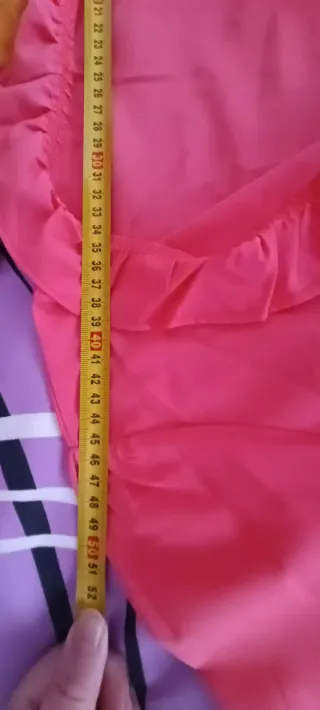 Blusa fucsia con volantes