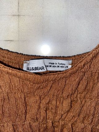 Top boho chic fruncido color terracota