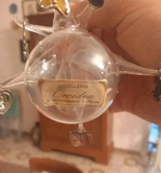 Decorazione in vetro soffiato e pendenti d'argento