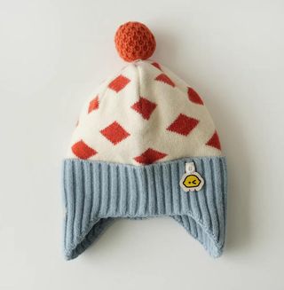 Gorro de lana con pompón y estampado