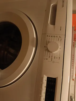 Lavadora con tambor roto