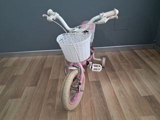 Bicicletta bambina rosa con cestino