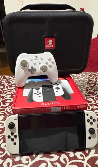 Nintendo switch oled blanca muy poco uso