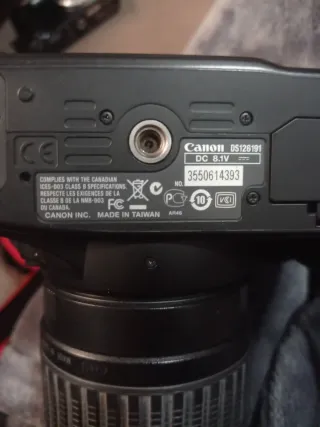 Cámara Canon EOS Digital con objetivo Tamron