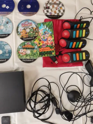 PS2 + 16 juegos + 4 mandos+ 8 Buzz con y sin cable
