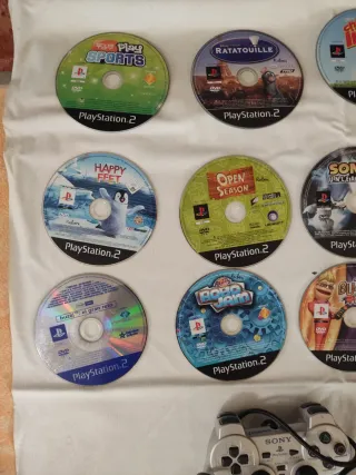 PS2 + 16 juegos + 4 mandos+ 8 Buzz con y sin cable