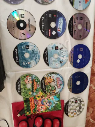 PS2 + 16 juegos + 4 mandos+ 8 Buzz con y sin cable