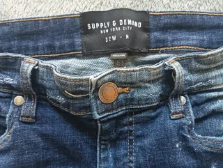 Pantalones vaqueros Supply & Demand desgastados