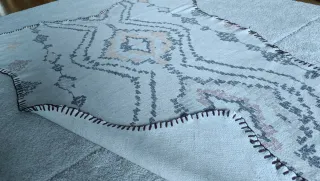 Alfombra de algodón con diseño geométrico