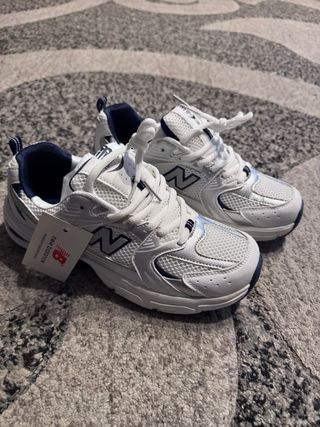 Zapatillas New Balance Running Blancas Plata