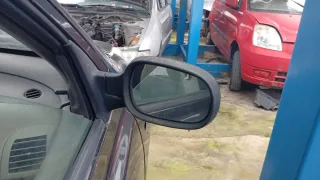 Retrovisor derecho y luz matrícula