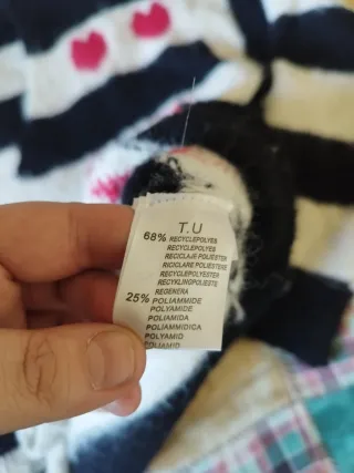 Cardigan con cuoricini e righe