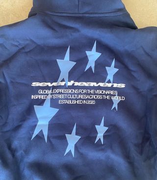 Sudadera azul marino con logo estrellado