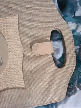 Álbum de fotos beige con diseño de ángel