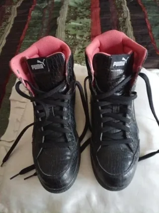 Sneakers Puma alte nere con dettagli rosa