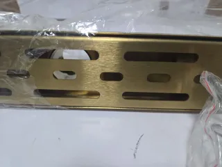 Desagüe para Ducha  de metal dorado