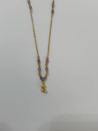 Pulsera y colgante Tous.