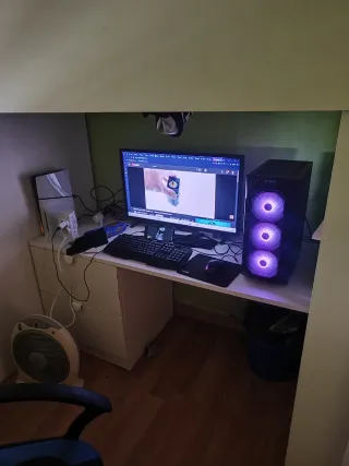 Cama alta con escritorio y armario