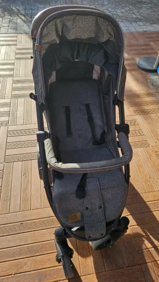 Silla de paseo con saco gris