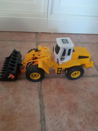 Camión volquete y pala excavadora de juguete