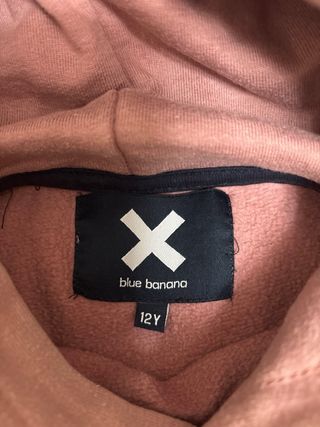 Sudadera rosa con parche X en perfecto estado