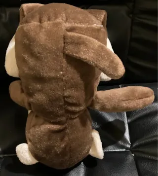 Scimmietta peluche marrone e bianca