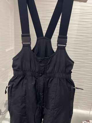 Equipación de esquí naranja y negra T.14-16