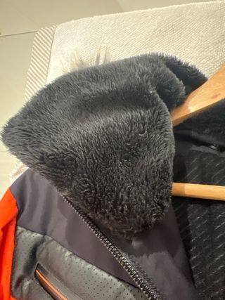 Equipación de esquí naranja y negra T.14-16