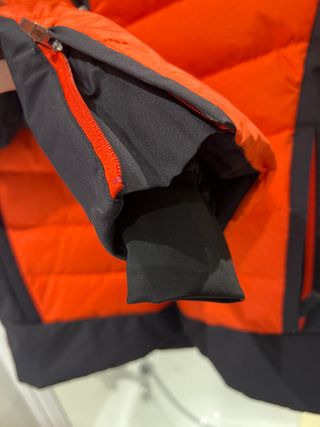 Equipación de esquí naranja y negra T.14-16