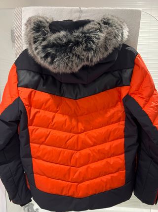 Equipación de esquí naranja y negra T.14-16