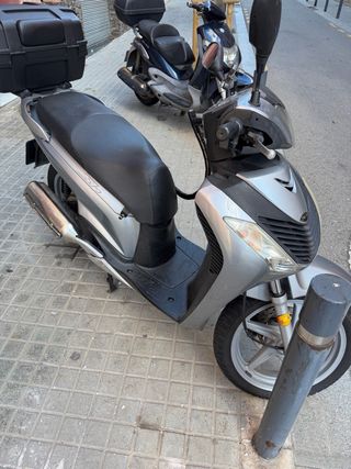 Honda SH 125i 2010 con 85000 km todo ay dia