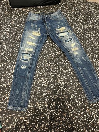 Pantalón vaquero desgastado azul