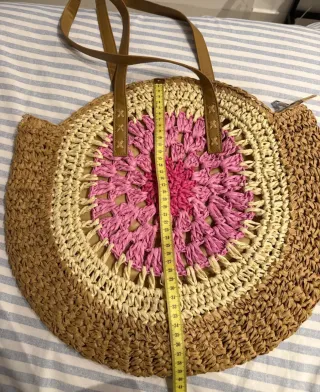 Bolso redondo tejido rosa y marrón