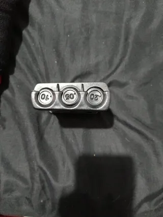 Porta monedas negro y plateado