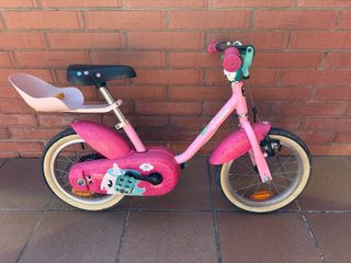 Bici infantil rosa Decathlon con soporte
