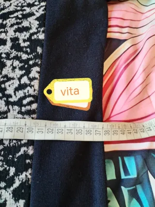 Abito nero con fantasia animalier